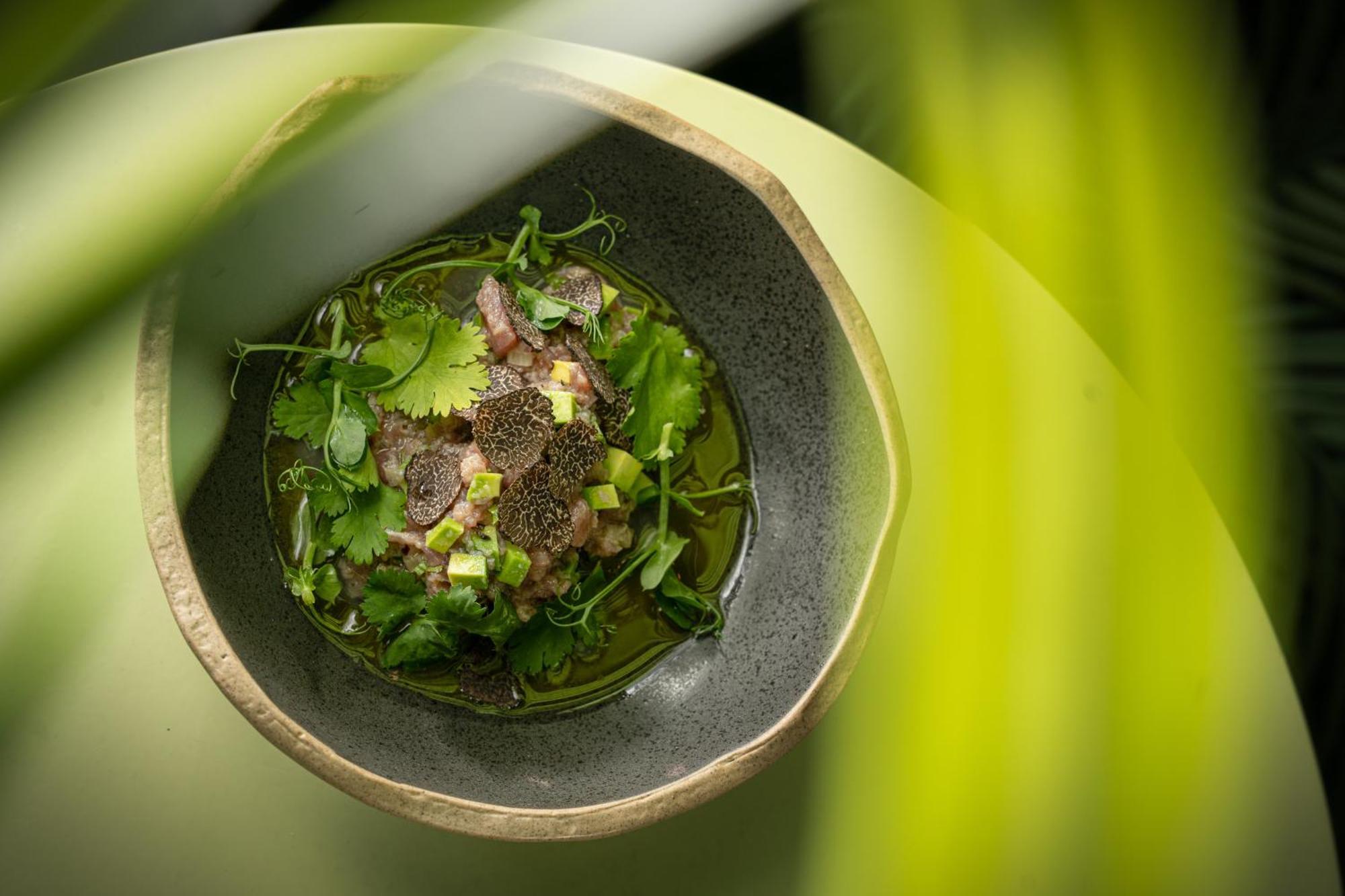 Falkensteiner Boutique Hotel Prague Exterior photo A dish of olive oil with herbs